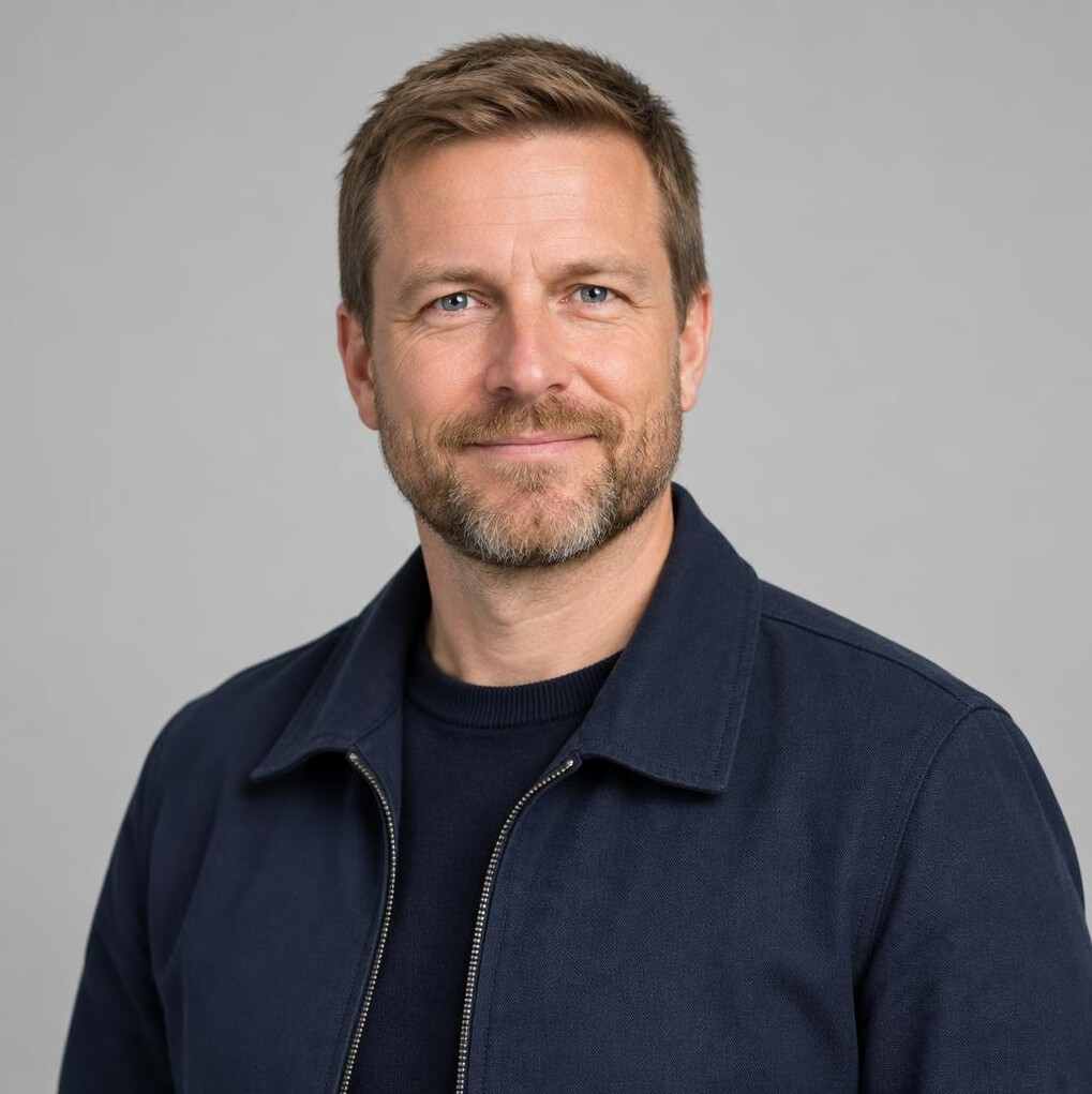 Portrait of a Scandinavian man in a suit with short hair